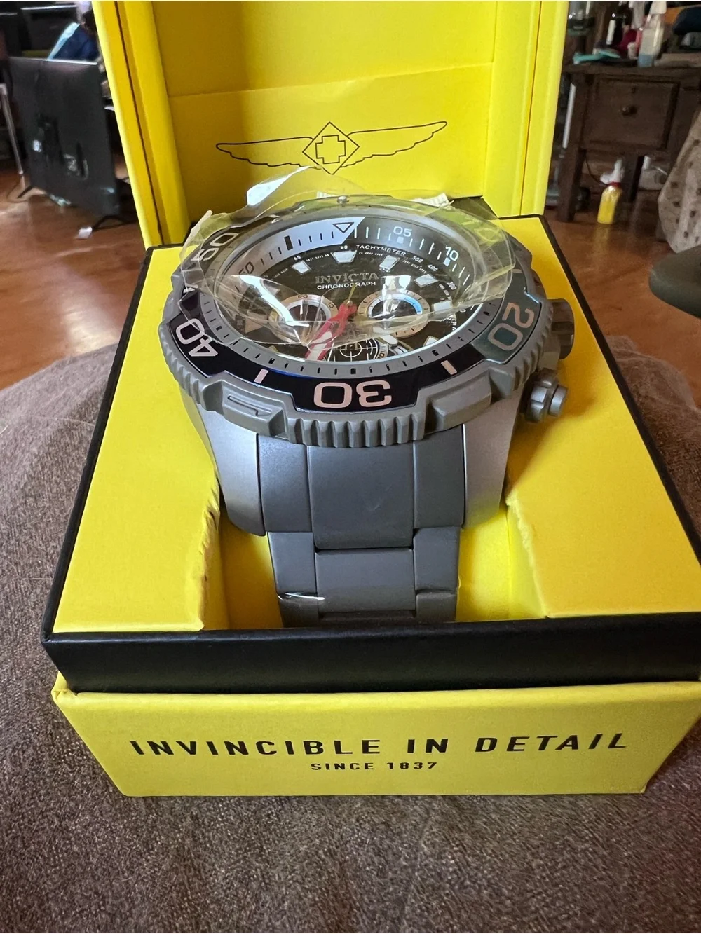 Invicta Men’s Black Dial Silver Case Chronograph Watch with Blue Accent